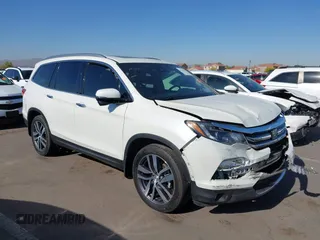 2017 Honda Pilot Touring with VIN 5FNYF5H97HB013939, listed as a IAAI auction lot 42137621 with 56,017 mi miles and . Bid and sale history available at DreamBid. Image 1.