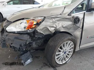 2015 Ford C-Max SEL z VIN 1FADP5CU8FL100255, wystawiony jako IAAI lot #42183172 z przebiegiem 101 606 mil mil oraz . Historia ofert i sprzedaży dostępna na DreamBid. Obrazek 6.