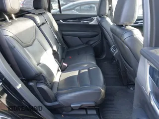 2023 Cadillac XT6 FWD Premium Luxury with VIN 1GYKPCRS1PZ105964, listed as a IAAI auction lot 41525039 with 70,603 mi miles and . Bid and sale history available at DreamBid. Image 8.