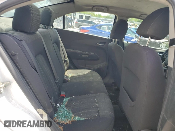 2014 Chevrolet Sonic LT with VIN 1G1JC5SH8E4242409, listed as a Copart auction lot 55356865 with 141,497 mi miles and Clean Title. Bid and sale history available at DreamBid. Image 14.