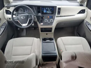 2017 Toyota Sienna LE with VIN 5TDJZ3DC8HS149992, listed as a Copart auction lot 51878725 with 90,299 mi miles and Salvage title. Bid and sale history available at DreamBid. Image 8.