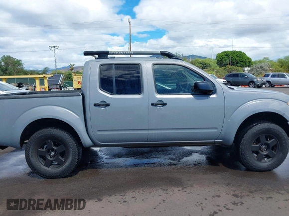2007 Nissan Frontier LE with VIN 1N6AD07W17C438647, listed as a IAAI auction lot 40502289 with 153,553 mi miles and . Bid and sale history available at DreamBid. Image 13.