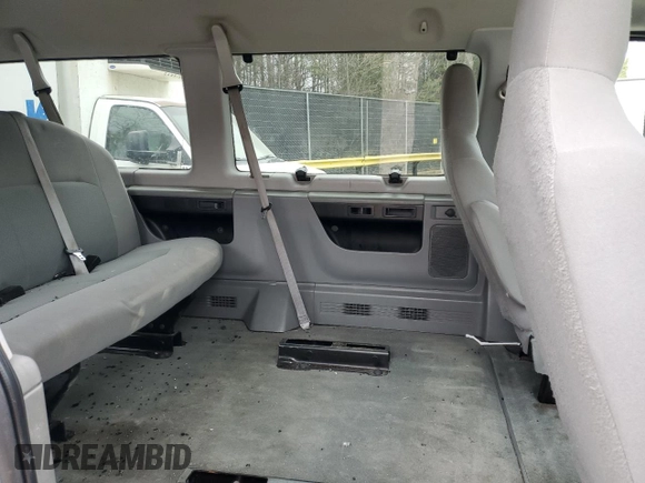 2012 Ford Econoline Passenger XL with VIN 1FBSS3BL7CDA01868, listed as a Copart auction lot 48528915 with 85,830 mi miles and Salvage Title. Bid and sale history available at DreamBid. Image 11.