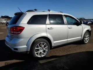 2013 Dodge Journey Crew with VIN 3C4PDCCG3DT642654, listed as a Copart auction lot 48866915 with 207,362 mi miles and Salvage title. Bid and sale history available at DreamBid. Image 3.