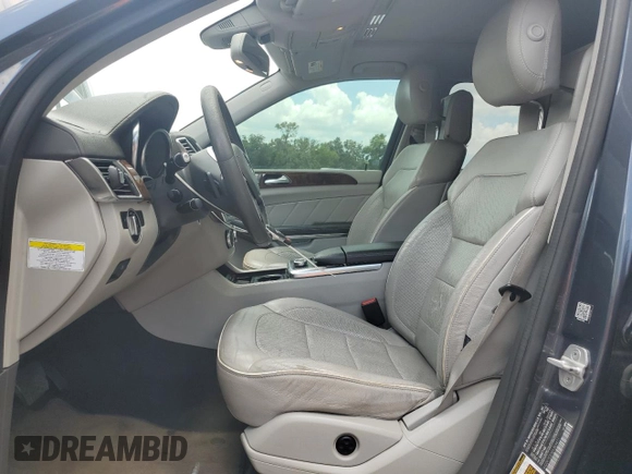 2014 Mercedes-Benz GL 450 z VIN 4JGDF7CE0EA303471, wystawiony jako Copart lot #58673045 z przebiegiem 182 455 mil mil oraz Tytuł czysty. Historia ofert i sprzedaży dostępna na DreamBid. Obrazek 7.