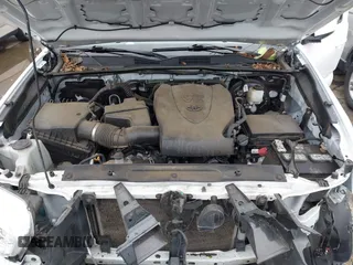 2021 Toyota Tacoma SR z VIN 3TMCZ5AN5MM417384, wystawiony jako IAAI lot #41617168 z przebiegiem 55 969 mil mil oraz . Historia ofert i sprzedaży dostępna na DreamBid. Obrazek 10.