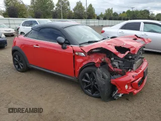 2014 MINI Coupe S z VIN WMWSX3C59ET409176, wystawiony jako Copart lot #72736864 z przebiegiem Nie podano mil oraz Szkody całkowita. Historia ofert i sprzedaży dostępna na DreamBid. Obrazek 4.
