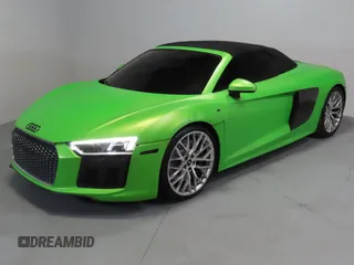 2017 Audi R8 z VIN WUAVACFX5H7903923, wystawiony jako Copart lot #52993935 z przebiegiem 53 883 mil mil oraz Szkoda całkowita • Salvage title. Historia ofert i sprzedaży dostępna na DreamBid. Obrazek 2.