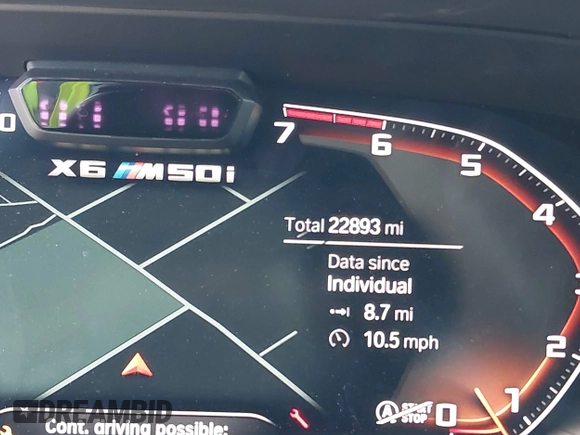 2022 BMW X6 M50i z VIN 5UXCY8C01N9J14882, wystawiony jako IAAI lot #41856966 z przebiegiem 22 893 mil mil oraz . Historia ofert i sprzedaży dostępna na DreamBid. Obrazek 7.