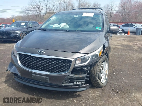 2016 Kia Sedona LX with VIN KNDMB5C11G6158934, listed as a IAAI auction lot 41908323 with 105,888 mi miles and . Bid and sale history available at carsss.com. Image 17.
