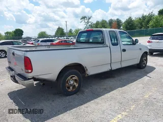 1998 Ford F-150 with VIN 1FTZX1767WNB79135, listed as a IAAI auction lot 42251761 with 221,839 mi miles and . Bid and sale history available at DreamBid. Image 4.