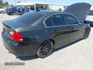 2008 BMW 3 Series 335xi with VIN WBAVD53578A284258, listed as a IAAI auction lot 42050367 with 184,998 mi miles. Bid and sale history available at carsss.com. Image 4.