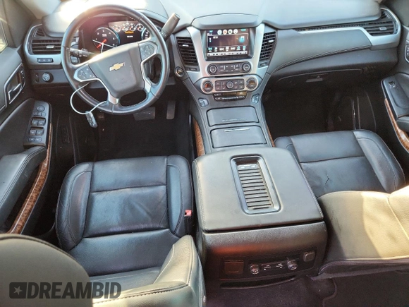 2019 Chevrolet Suburban LT with VIN 1GNSCJKC3KR129739, listed as a Copart auction lot 62377465 with 105,771 mi miles and Salvage title. Bid and sale history available at DreamBid. Image 8.
