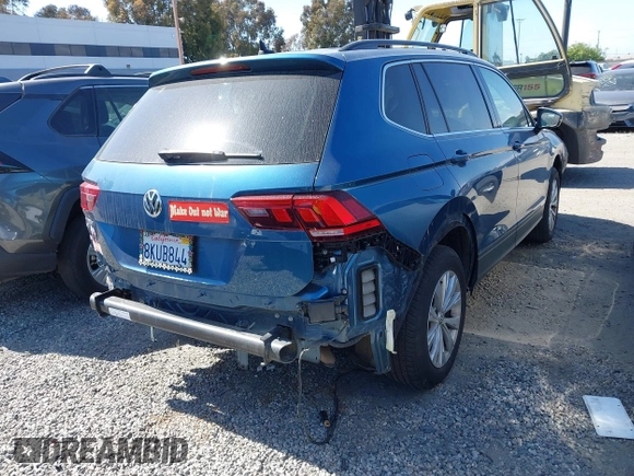 2019 Volkswagen Tiguan SE with VIN 3VV3B7AX2KM067907, listed as a IAAI auction lot 41841360 with 19,269 mi miles and . Bid and sale history available at DreamBid. Image 4.