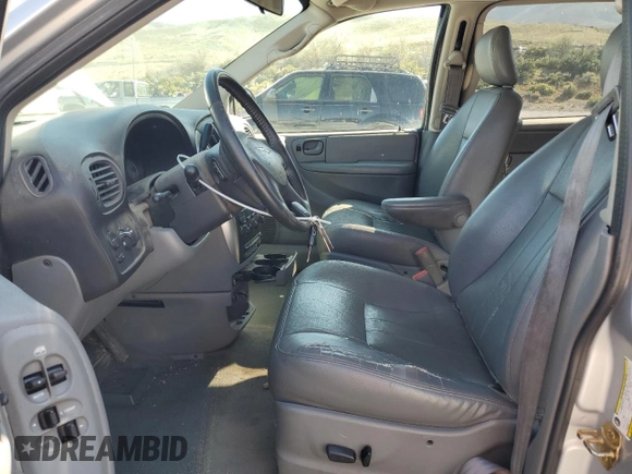 2005 Chrysler Town & Country Touring z VIN 2C4GP54L05R430233, wystawiony jako Copart lot #56189765 z przebiegiem 190 187 mil mil oraz Szkody całkowita. Historia ofert i sprzedaży dostępna na DreamBid. Obrazek 7.