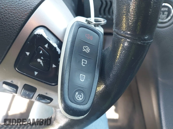 2014 Ford Taurus Limited with VIN 1FAHP2F80EG104984, listed as a IAAI auction lot 41910463 with 174,034 mi miles. Bid and sale history available at carsss.com. Image 11.