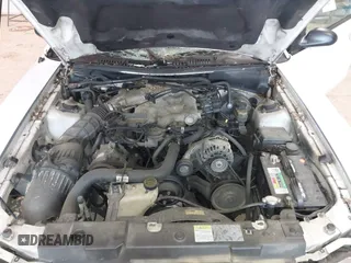 2003 Ford Mustang Standard with VIN 1FAFP40493F381211, listed as a IAAI auction lot 41814640 with 312,991 mi miles. Bid and sale history available at carsss.com. Image 10.