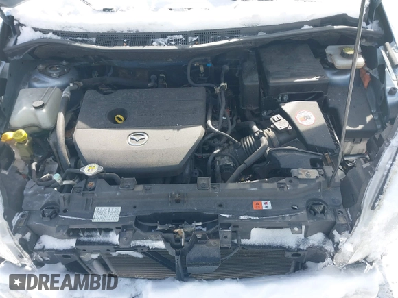 2012 Mazda Mazda5 Grand Touring with VIN JM1CW2DL4C0115863, listed as a IAAI auction lot 41588193 with 144,206 mi miles. Bid and sale history available at carsss.com. Image 10.