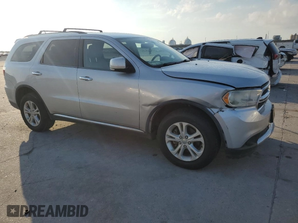 2013 Dodge Durango Crew with VIN 1C4RDHDG1DC616909, listed as a Copart auction lot 61923565 with 98,264 mi miles and Salvage title. Bid and sale history available at DreamBid. Image 4.