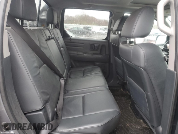 2014 Honda Ridgeline RTL с VIN 5FPYK1F50EB008282, выставлен на аукционе Copart как лот 51748265 с пробегом 124 609 миль миль и Чистый • Clean title. История ставок и продаж доступна на DreamBid. Изображение 10.