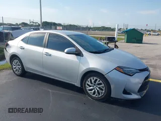 2018 Toyota Corolla L z VIN 2T1BURHE1JC049409, wystawiony jako IAAI lot #42342515 z przebiegiem 49 147 mil mil oraz . Historia ofert i sprzedaży dostępna na DreamBid. Obrazek 1.
