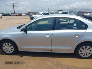 2013 Volkswagen Jetta S with VIN 3VW2K7AJ4DM410383, listed as a IAAI auction lot 42627193 with 154,300 mi miles and . Bid and sale history available at DreamBid. Image 14.