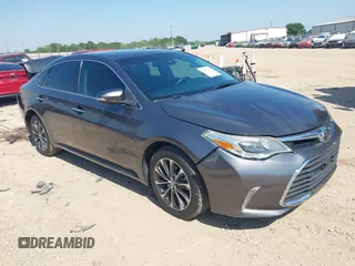 2018 Toyota Avalon XLE with VIN 4T1BK1EB1JU285770, listed as a IAAI auction lot 42073553 with 71,809 mi miles and . Bid and sale history available at DreamBid. Image 1.