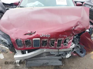 2019 Jeep Cherokee Latitude Plus with VIN 1C4PJLLB9KD434990, listed as a IAAI auction lot 41959477 with 96,283 mi miles and . Bid and sale history available at DreamBid. Image 6.