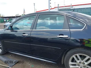 2012 Chevrolet Impala LTZ with VIN 2G1WC5E34C1185172, listed as a IAAI auction lot 42176707 with 150,035 mi miles and . Bid and sale history available at DreamBid. Image 14.