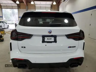 2023 BMW X3 M40i with VIN 5UX83DP00P9S39432, listed as a Copart auction lot 82797514 with Not Provided miles and Salvage Title. Bid and sale history available at DreamBid. Image 6.