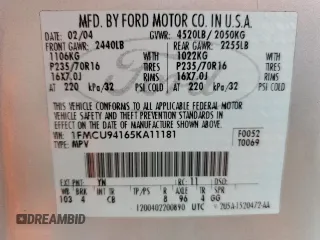 2005 Ford Escape Limited with VIN 1FMCU94165KA11181, listed as a Copart auction lot 62880725 with 180,152 mi miles and Salvage title. Bid and sale history available at DreamBid. Image 14.