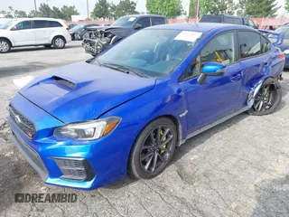 2020 Subaru WRX STI with VIN JF1VA2E63L9806965, listed as a IAAI auction lot 42342839 with 106,863 mi miles and . Bid and sale history available at DreamBid. Image 23.