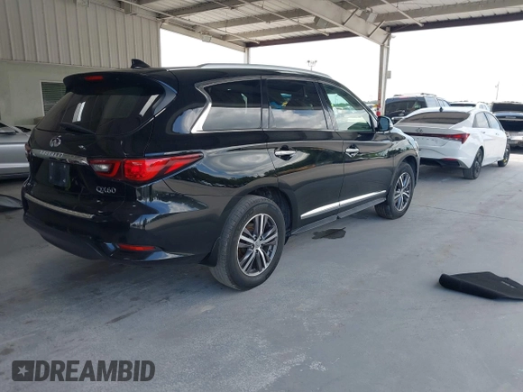 2019 Infiniti QX60 Luxe with VIN 5N1DL0MN9KC511685, listed as a IAAI auction lot 42669346 with 249,322 mi miles and . Bid and sale history available at DreamBid. Image 4.