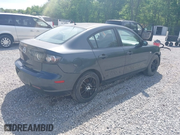 2009 Mazda 3 i Touring Value with VIN JM1BK32F291249221, listed as a IAAI auction lot 42006435 with 249,775 mi miles. Bid and sale history available at carsss.com. Image 4.
