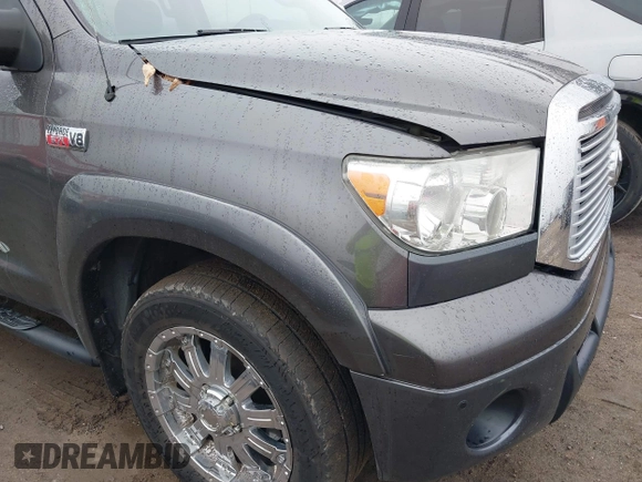 2012 Toyota Tundra 4WD Truck LTD with VIN 5TFHW5F17CX211075, listed as a IAAI auction lot 41510976 with 204,930 mi miles. Bid and sale history available at carsss.com. Image 20.