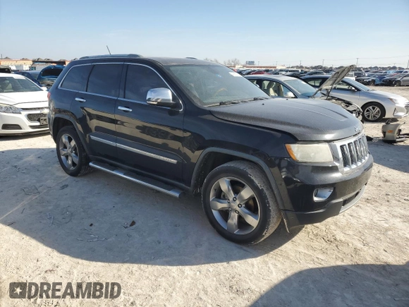2012 Jeep Grand Cherokee Overland with VIN 1C4RJECT3CC125620, listed as a Copart auction lot 45553565 with 168,409 mi miles and Salvage Title. Bid and sale history available at carsss.com. Image 4.