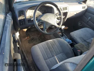 1995 Nissan Frontier XE z VIN 1N6HD16S9SC465896, wystawiony jako Copart lot #81665514 z przebiegiem 212 893 mil mil oraz Szkoda całkowita • Salvage title. Historia ofert i sprzedaży dostępna na DreamBid. Obrazek 8.