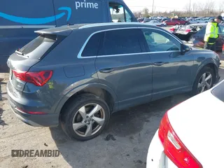 2019 Audi Q3 Premium with VIN WA1AECF34K1077065, listed as a IAAI auction lot 40826923 with 85,458 mi miles and . Bid and sale history available at DreamBid. Image 4.
