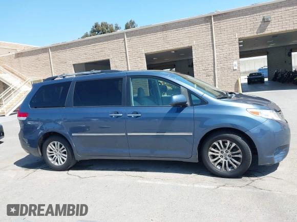 2014 Toyota Sienna XLE with VIN 5TDYK3DC5ES447155, listed as a IAAI auction lot 42003951 with 60,064 mi miles and . Bid and sale history available at DreamBid. Image 13.