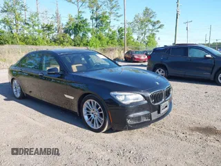 2015 BMW 7 Series 750Li with VIN WBAYE8C50FD781384, listed as a IAAI auction lot 42049829 with 128,087 mi miles. Bid and sale history available at carsss.com. Image 1.