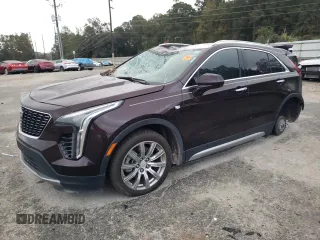 2020 Cadillac XT4 FWD Premium Luxury with VIN 1GYFZCR42LF149030, listed as a Copart auction lot 82671894 with 88,570 mi miles and Salvage Title. Bid and sale history available at carsss.com. Image 1.