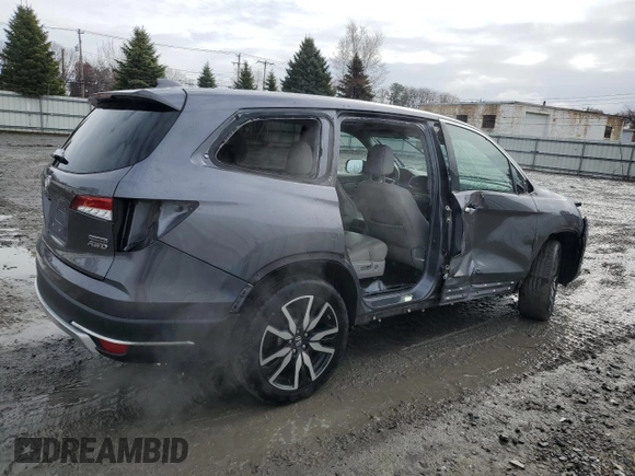 2020 Honda Pilot Touring 7-Passenger with VIN 5FNYF6H60LB039609, listed as a Copart auction lot 51753425 with 57,512 mi miles and Salvage title. Bid and sale history available at DreamBid. Image 3.