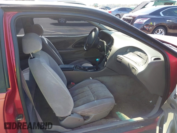 1996 Ford Thunderbird LX z VIN 1FALP62W0TH142986, wystawiony jako IAAI lot #42030900 z przebiegiem 168 993 mil mil oraz . Historia ofert i sprzedaży dostępna na DreamBid. Obrazek 5.
