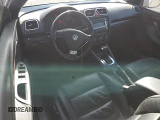 2009 Volkswagen Eos Lux с VIN WVWFA71F99V011940, выставлен на аукционе Copart как лот 48558885 с пробегом 75 242 миль миль и Списание • Salvage title. История ставок и продаж доступна на DreamBid. Изображение 8.