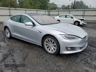 2017 Tesla Model S 100D with VIN 5YJSA1E20HF190126, listed as a Copart auction lot 60087655 with 42,025 mi miles and Salvage title. Bid and sale history available at DreamBid. Image 4.