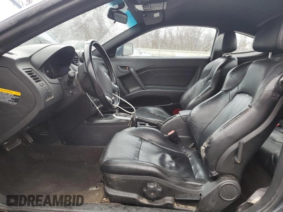 2003 Hyundai Tiburon GT z VIN KMHHN65F13U068658, wystawiony jako Copart lot #81799404 z przebiegiem 163 148 mil mil oraz Szkoda całkowita • Salvage title. Historia ofert i sprzedaży dostępna na DreamBid. Obrazek 7.