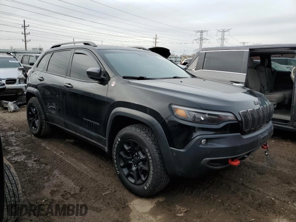 2019 Jeep Cherokee Trailhawk with VIN 1C4PJMBXXKD127749, listed as a Copart auction lot 50035205 with Not Provided miles and Salvage Title. Bid and sale history available at DreamBid. Image 4.