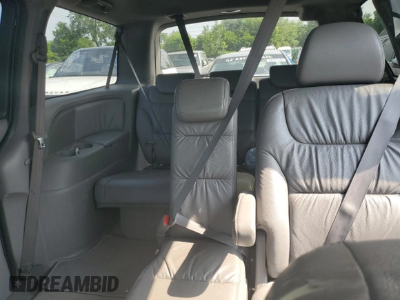 2010 Honda Odyssey EX-L z VIN 5FNRL3H73AB089714, wystawiony jako Copart lot #60276305 z przebiegiem 125 025 mil mil oraz Szkoda całkowita • Salvage title. Historia ofert i sprzedaży dostępna na DreamBid. Obrazek 10.