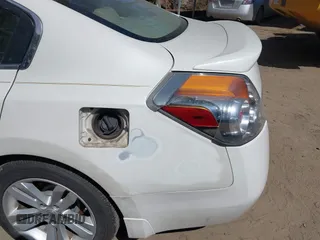 2010 Nissan Altima 3.5 SR with VIN 1N4BL2AP8AN538141, listed as a IAAI auction lot 41886965 with 156,364 mi miles. Bid and sale history available at carsss.com. Image 6.