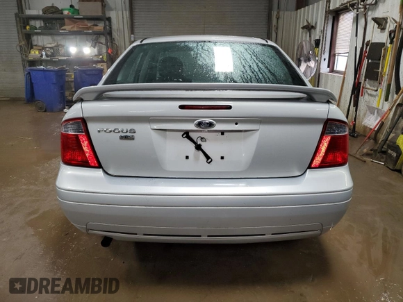 2007 Ford Focus S z VIN 1FAHP34N37W262789, wystawiony jako Copart lot #50814405 z przebiegiem 56 604 mil mil oraz Szkoda całkowita • Salvage title. Historia ofert i sprzedaży dostępna na DreamBid. Obrazek 6.